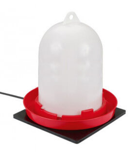 Plaque chauffante caoutchouc évite le gel de l'eau dans l'abreuvoir des poules en hiver.